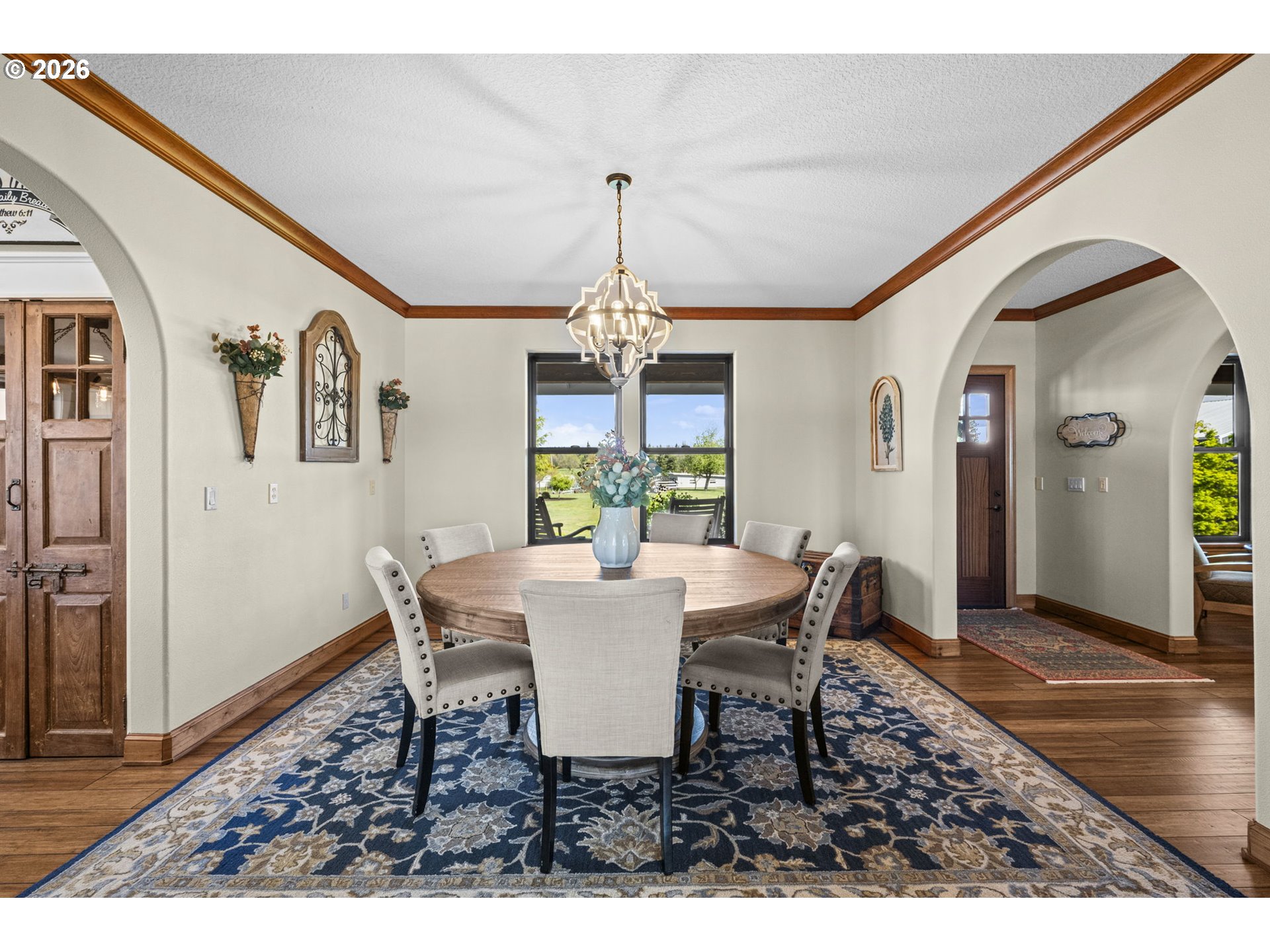 33246 South Wilhoit Road Molalla, OR 97038 - Photo 8 of 48 a view of a dining room with furniture window and wooden floor
