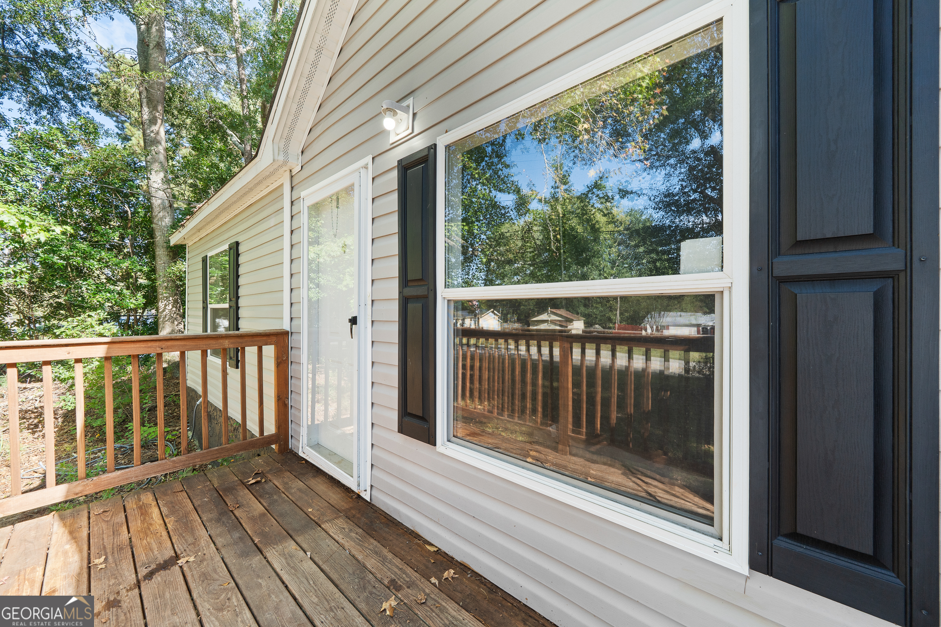 280 Lakeview Drive Locust Grove, GA 30248 - Photo 2 of 43 a view of a wooden deck