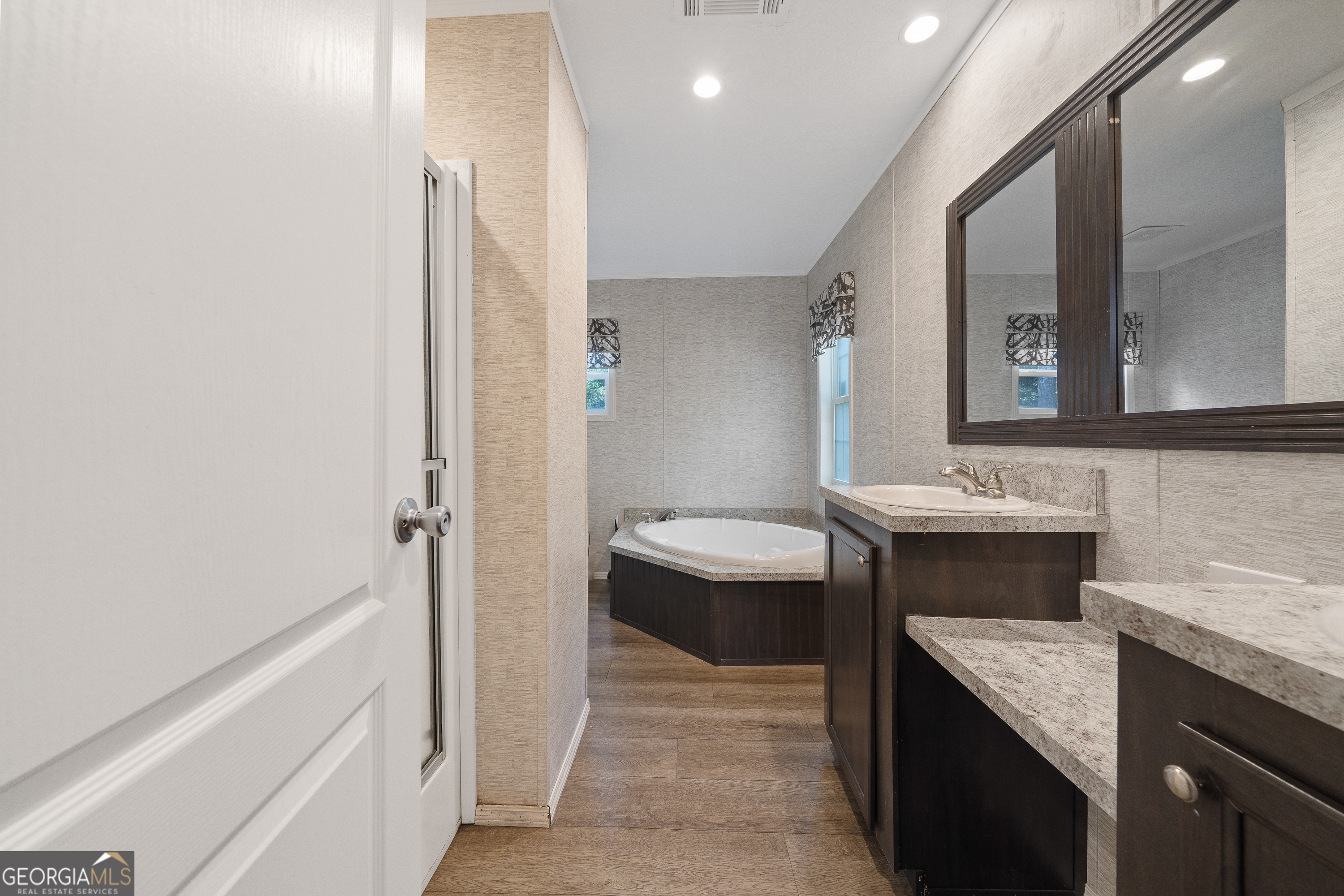 280 Lakeview Drive Locust Grove, GA 30248 - Photo 27 of 43 a bathroom with a sink and a mirror