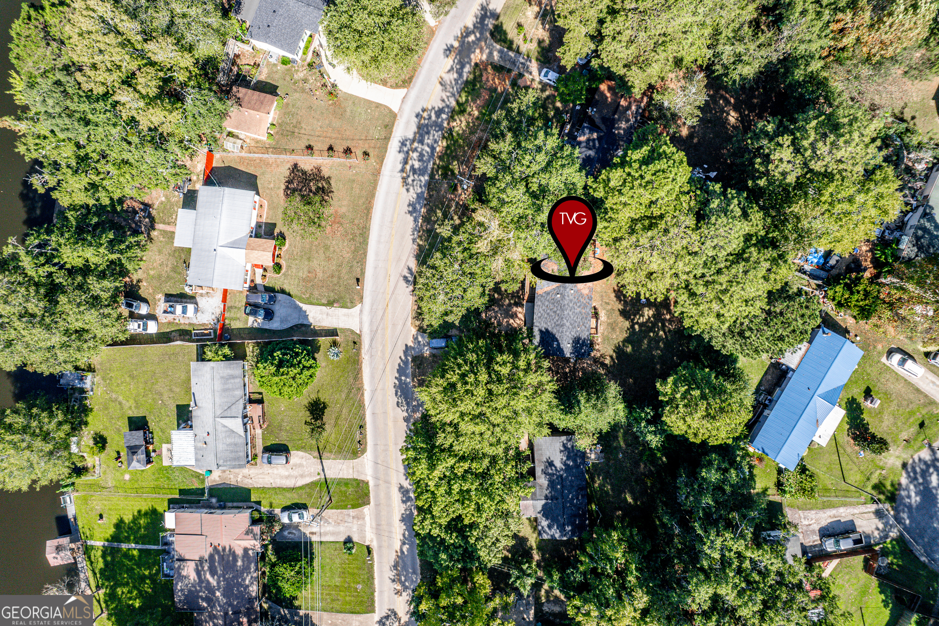 280 Lakeview Drive Locust Grove, GA 30248 - Photo 39 of 43 an aerial view of residential house with outdoor space and swimming pool