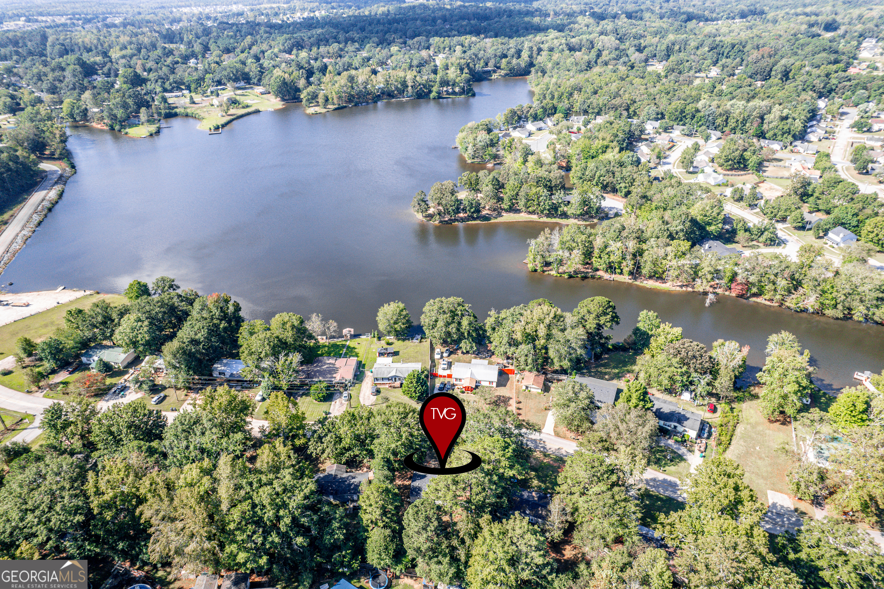 280 Lakeview Drive Locust Grove, GA 30248 - Photo 40 of 43 an aerial view of a house with a yard and lake view
