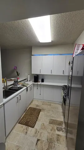 a room with furniture and a mirror