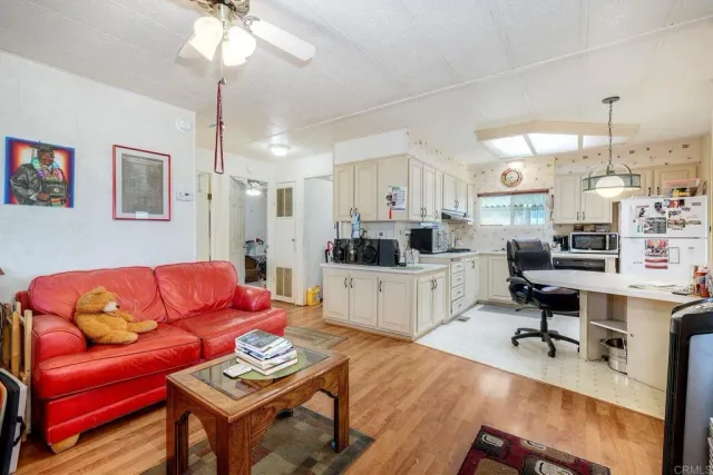 a bedroom with bed and window