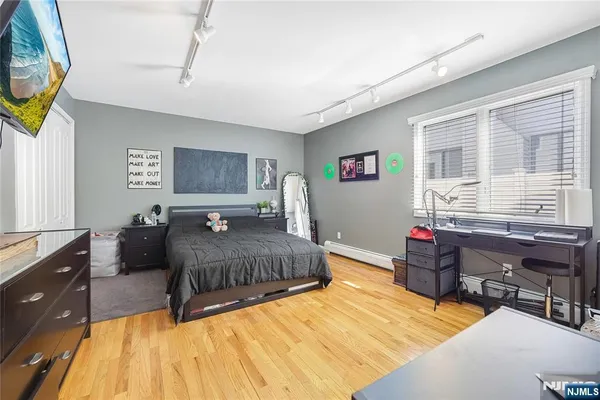a bed room with a bed and a couch