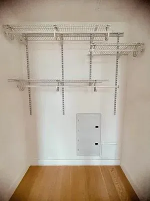 a kitchen with stainless steel appliances granite countertop a stove and a refrigerator