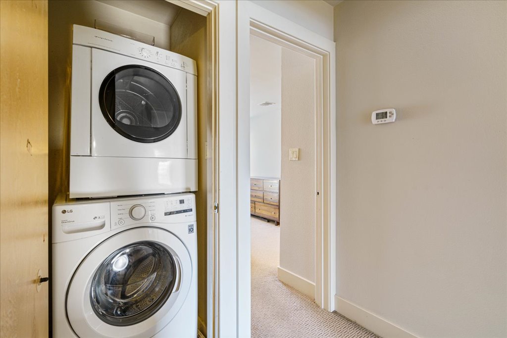 1101 Grove Boulevard, Unit 203 Austin, TX 78741 - Photo 14 of 27 a utility room with dryer and washer