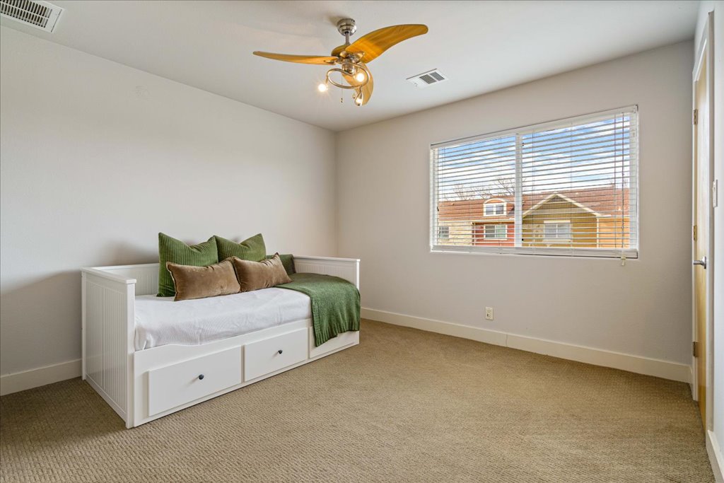 1101 Grove Boulevard, Unit 203 Austin, TX 78741 - Photo 20 of 27 a living room with furniture and a window