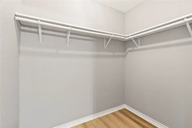 a view of an empty walk in closet