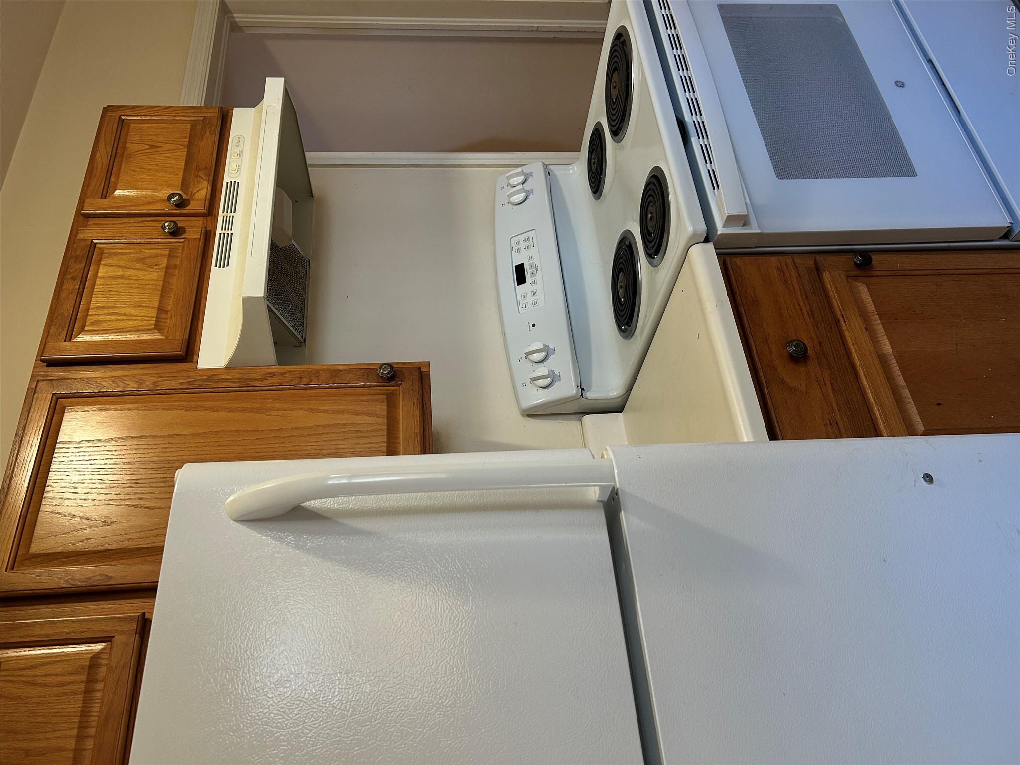853 Little Britain Road New Windsor, NY 12553 - Photo 14 of 22 a kitchen with stainless steel appliances granite countertop a stove and a refrigerator