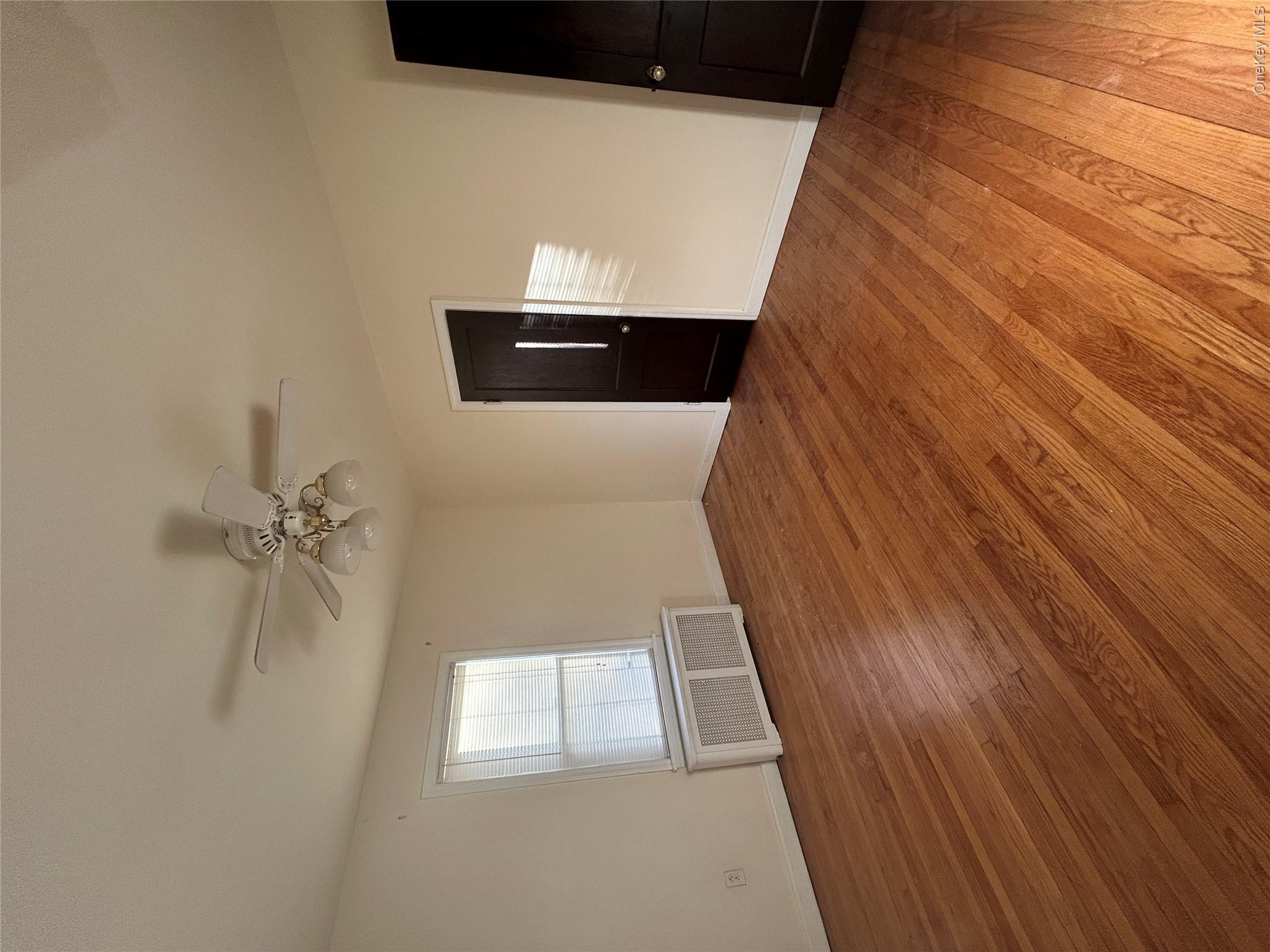 853 Little Britain Road New Windsor, NY 12553 - Photo 7 of 22 a view of empty room with wooden floor