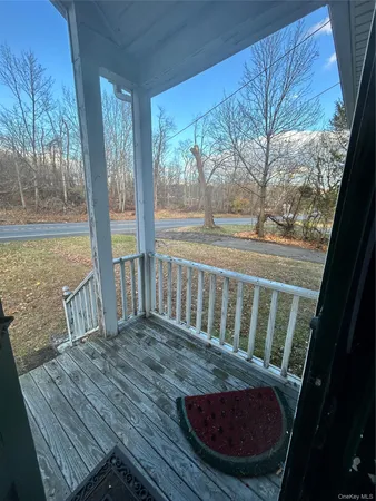 a view of house with yard