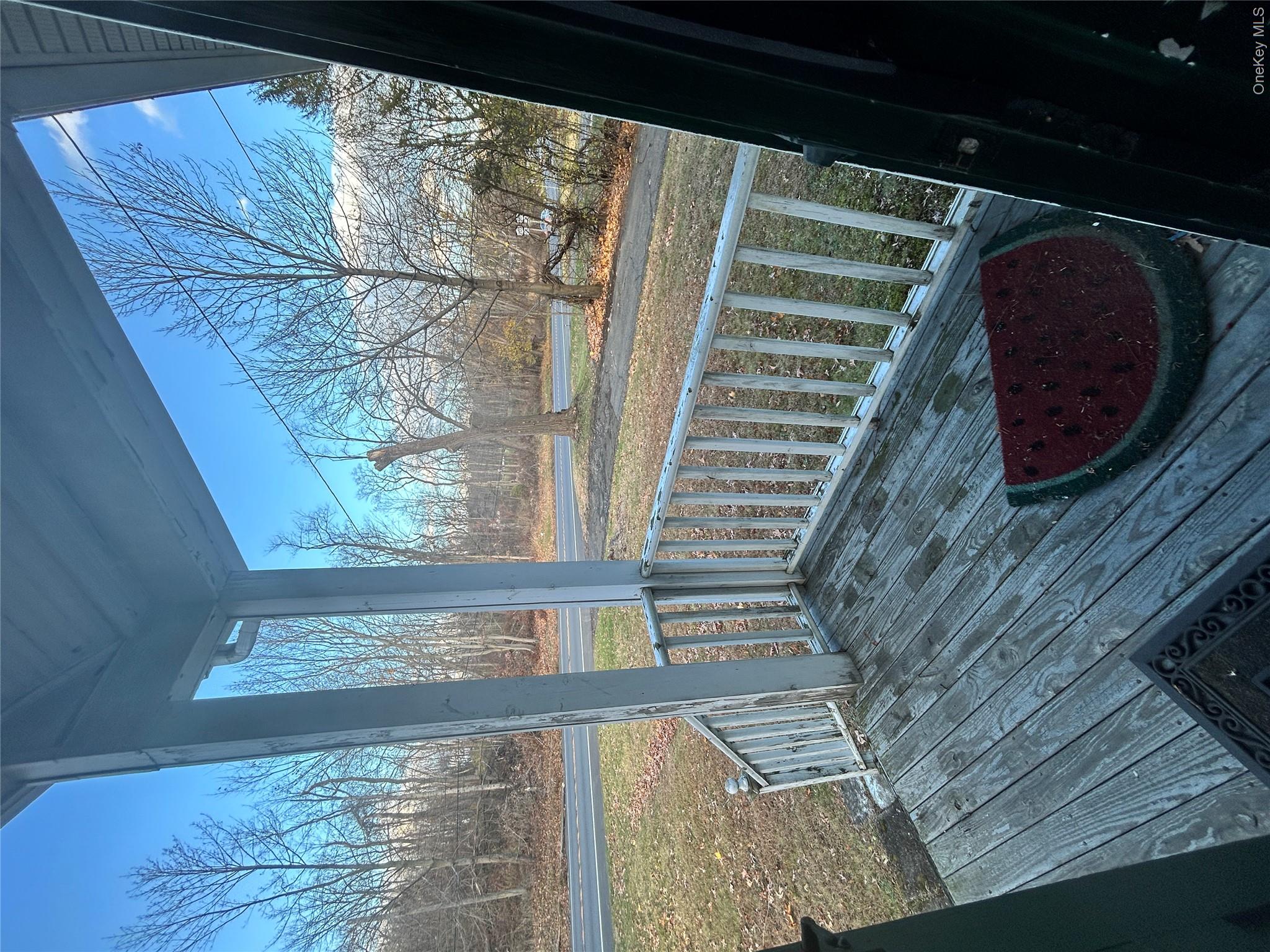 853 Little Britain Road New Windsor, NY 12553 - Photo 8 of 22 a view of a balcony with wooden floor