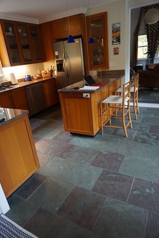 104 Still River Road Harvard, MA 01451 - Photo 18 of 42 a kitchen with table and chairs
