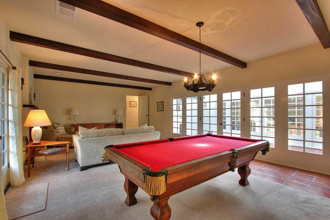 3035 Valdez Road Pebble Beach, CA 93953 - Photo 32 of 60 a room with pool table and windows