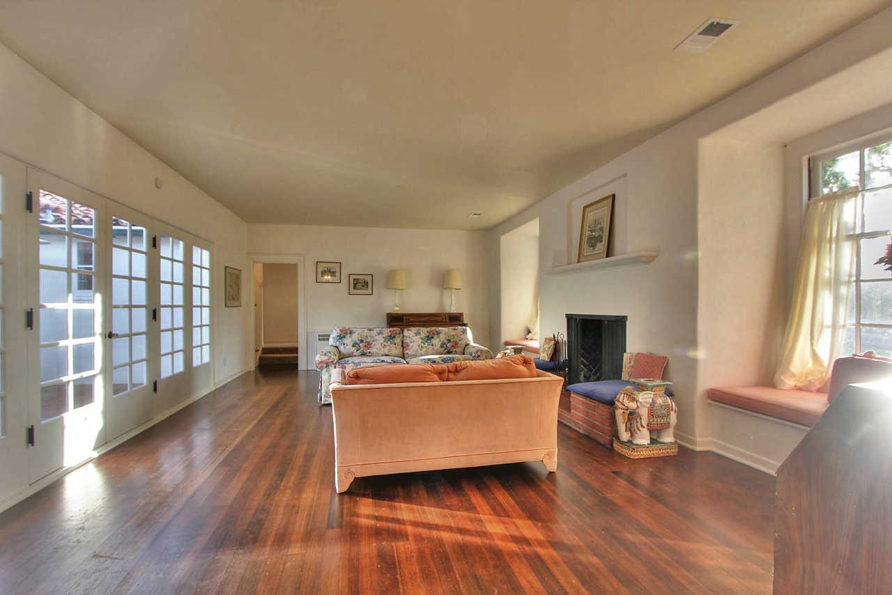 3035 Valdez Road Pebble Beach, CA 93953 - Photo 4 of 60 a living room with furniture and a fireplace