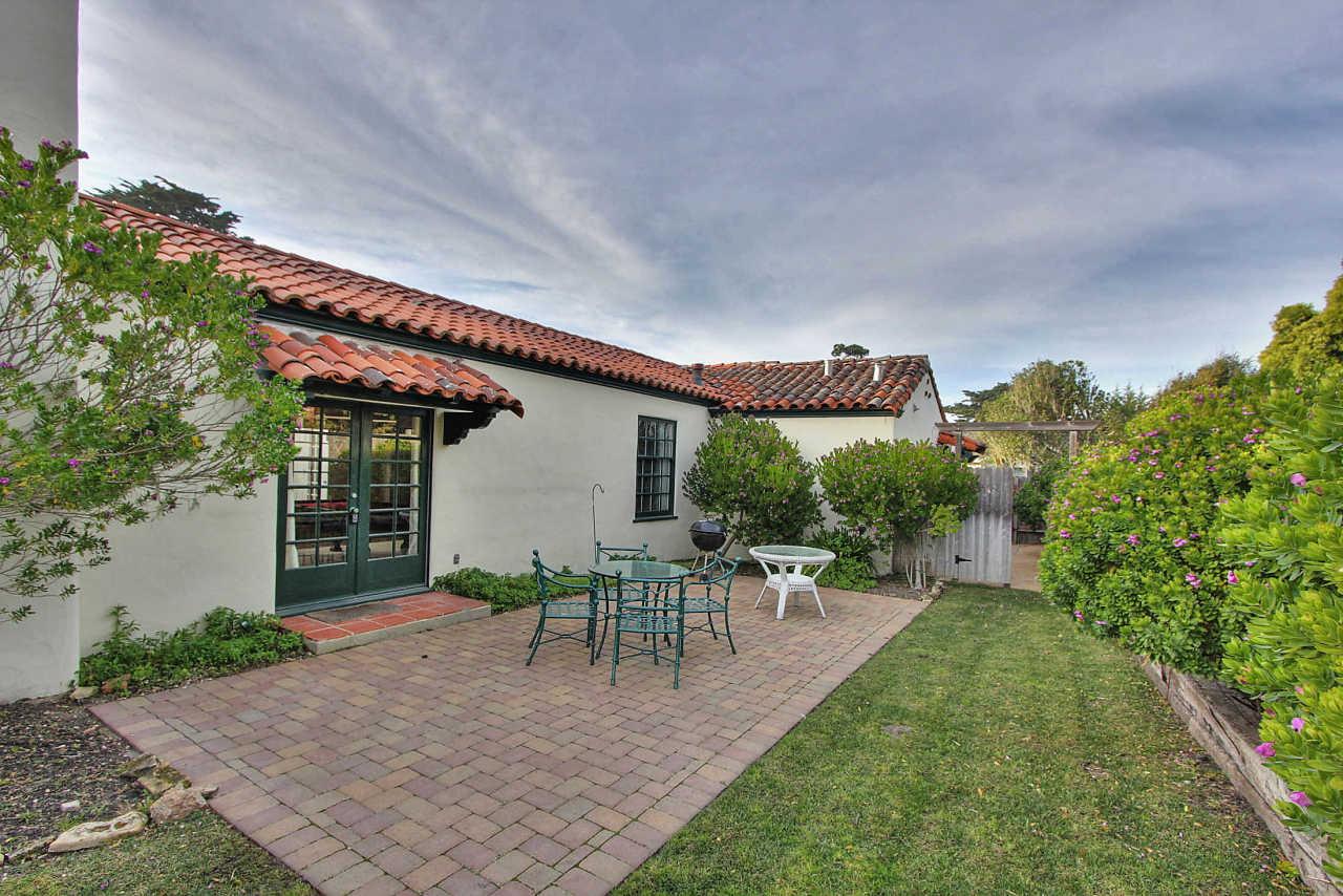 3035 Valdez Road Pebble Beach, CA 93953 - Photo 45 of 60 a view of a patio with table and chairs and potted plants