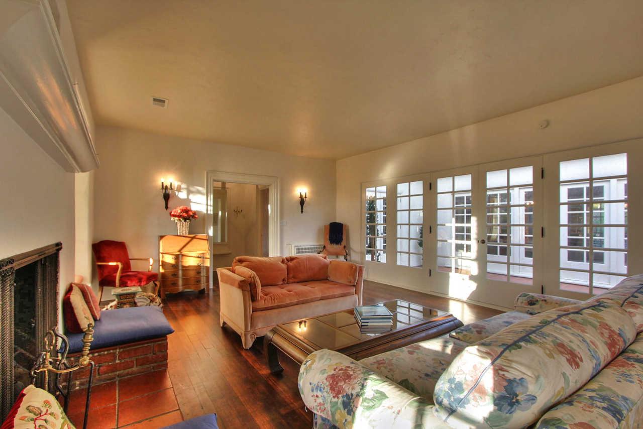 3035 Valdez Road Pebble Beach, CA 93953 - Photo 5 of 60 a living room with furniture and a large window