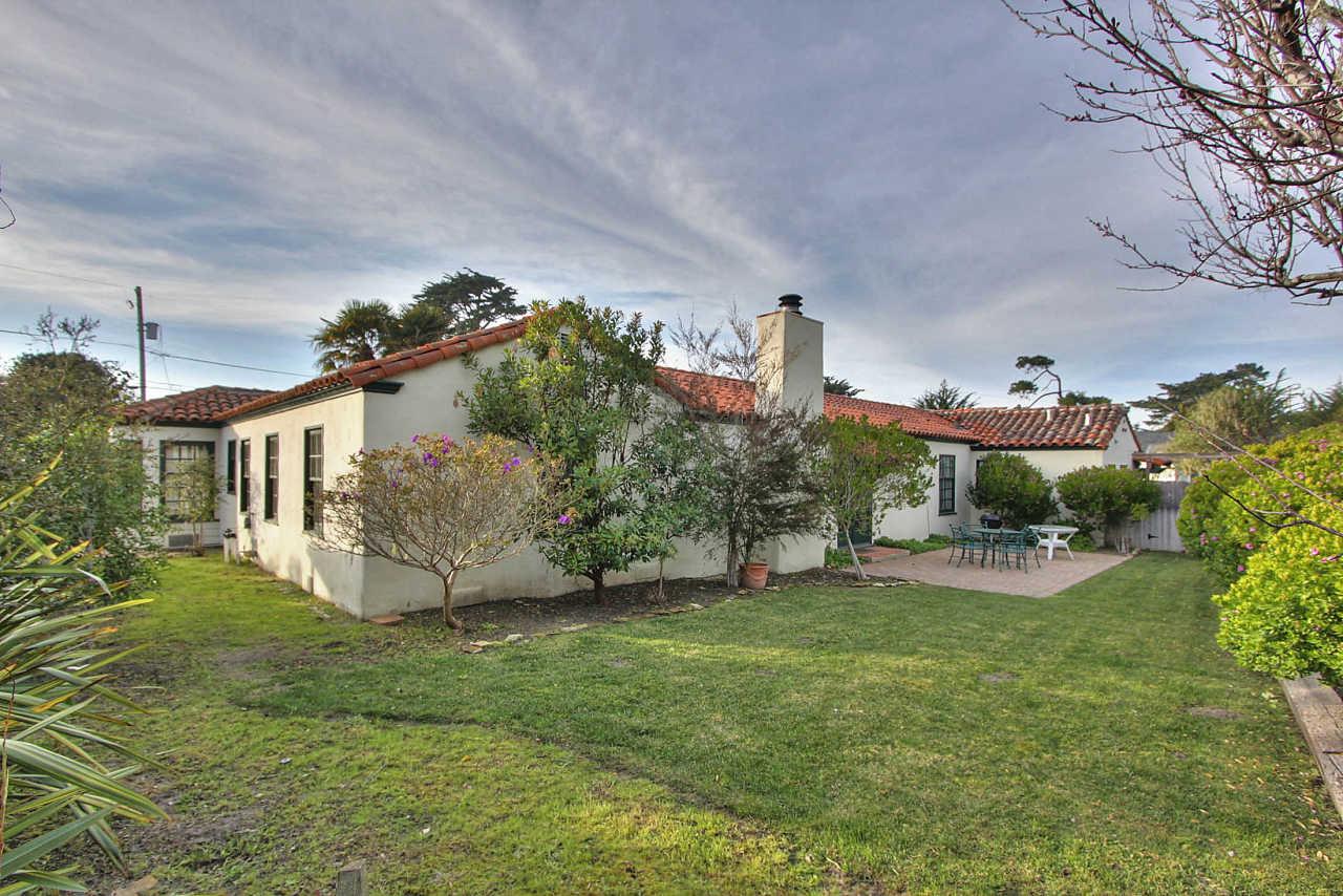 3035 Valdez Road Pebble Beach, CA 93953 - Photo 51 of 60 a view of a house with a yard and a garden
