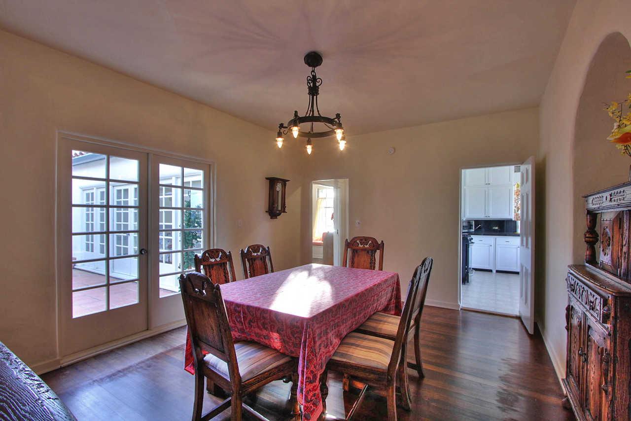 3035 Valdez Road Pebble Beach, CA 93953 - Photo 10 of 60 a view of a dining room with furniture window and wooden floor
