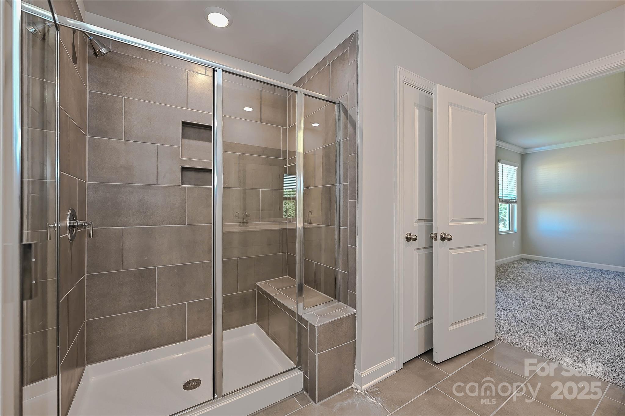 1313 30th St Lane Northeast Conover, NC 28613 - Photo 21 of 27 a bathroom with a shower and a mirror