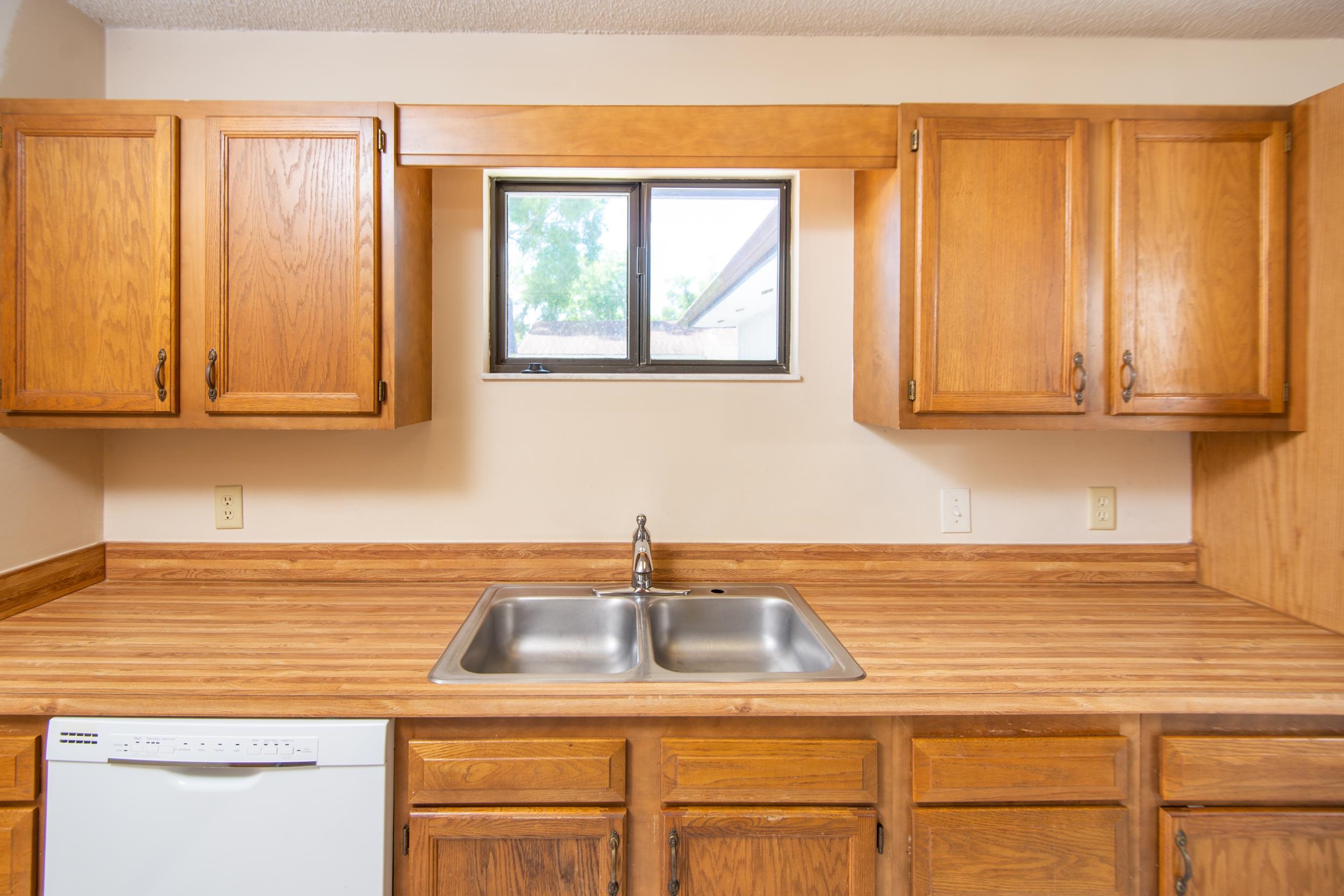 328 Linden Road St. Augustine, FL 32086 - Photo 19 of 62 a kitchen with stainless steel appliances granite countertop a sink a stove and a microwave