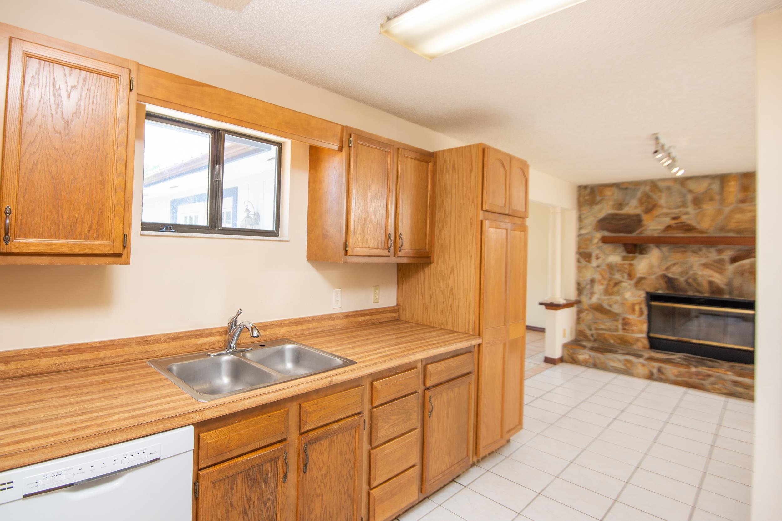 328 Linden Road St. Augustine, FL 32086 - Photo 20 of 62 a kitchen with stainless steel appliances granite countertop a sink and cabinets