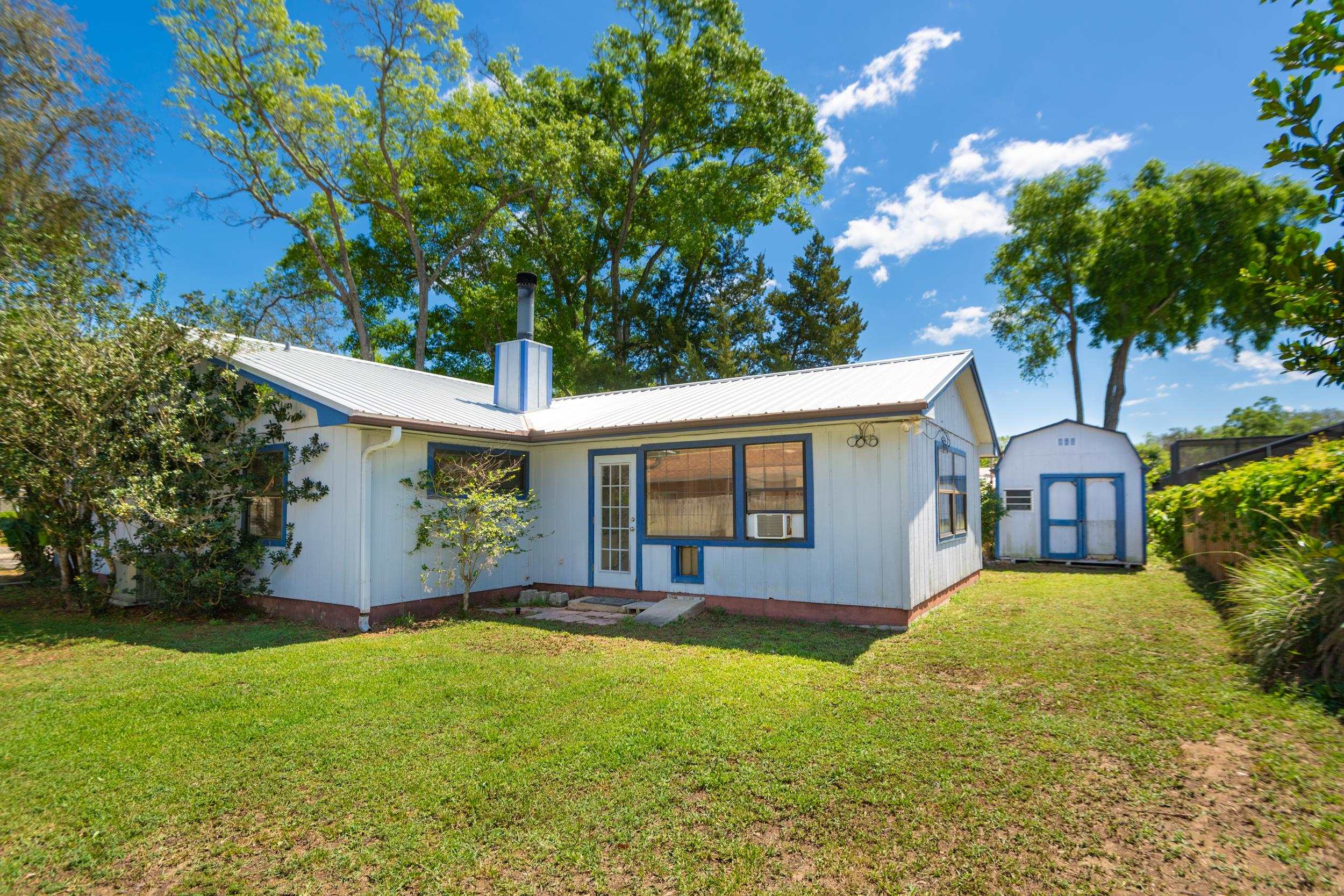 328 Linden Road St. Augustine, FL 32086 - Photo 29 of 62 front view of a house with a yard