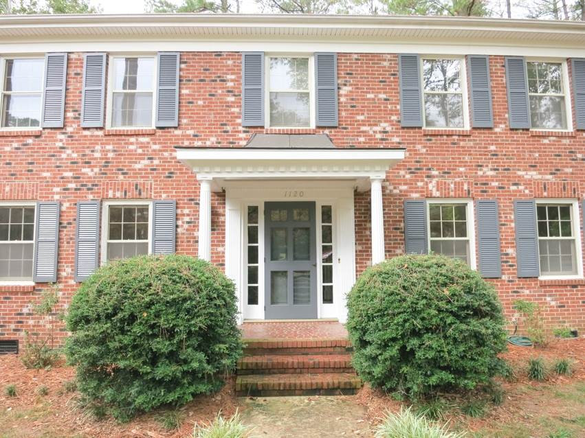1120 Country Ridge Drive Raleigh, NC 27609 - Photo 2 of 25 Welcoming covered Front Porch w/copper roof. Updates: 1st flr HVAC 2013, 2nd flr HVAC 2005, Roof 2004; upd KIT, HalfBath & MasterBath w/granite ctrs; NEW light fixtures thruout; freshly painted shutters/doors & FamRm cabinetry! Front Porch