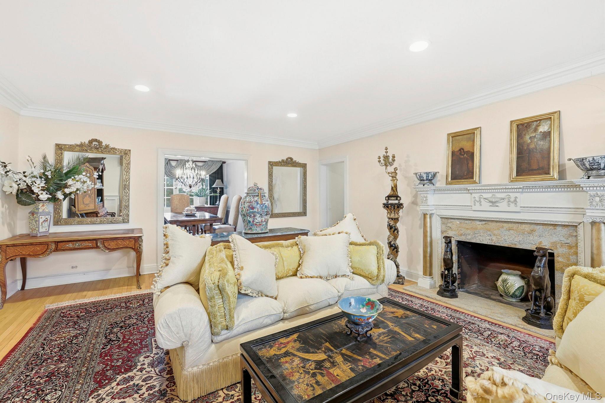 10 Brooklands, Unit 1H Bronxville, NY 10708 - Photo 8 of 33 a living room with furniture and a fireplace