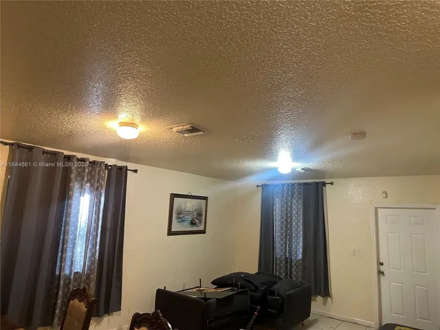 a view of a hallway with workspace