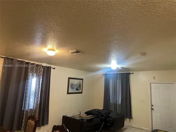 a view of a hallway with workspace