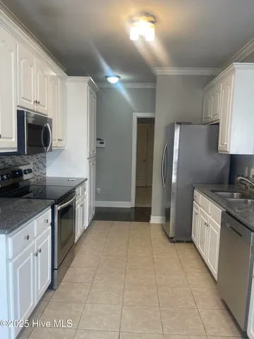 $305,000 | 2704 Millhaven Court West, Wilson, NC 27893