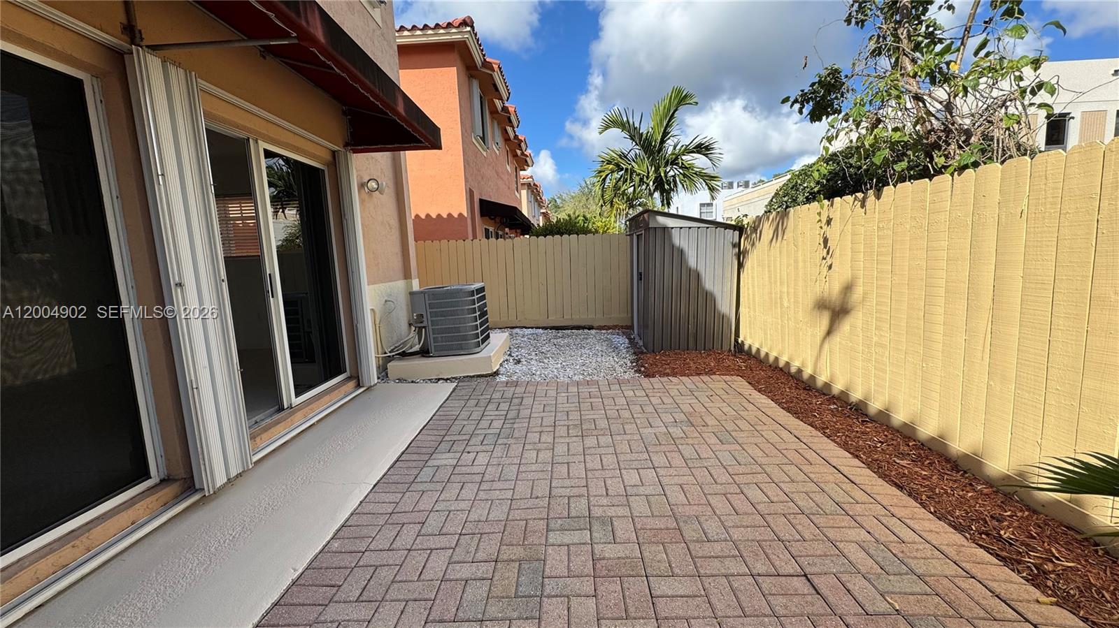 9465 Southwest 77th Court Miami, FL 33156 - Photo 23 of 25 a view of a door and a street view