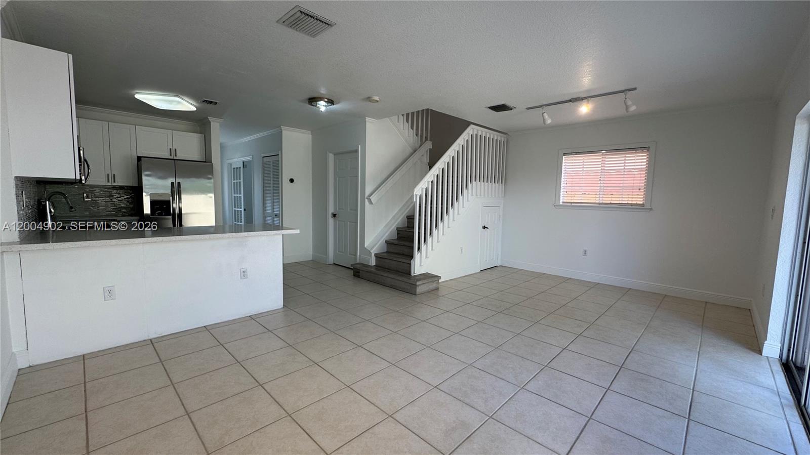9465 Southwest 77th Court Miami, FL 33156 - Photo 8 of 25 a view of a kitchen with electric appliances
