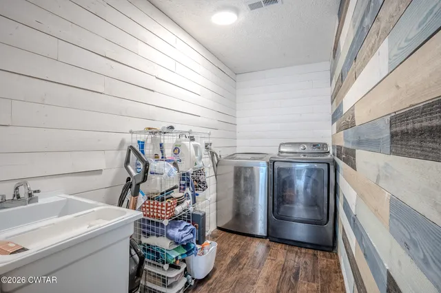 a utility room with dryer and washer