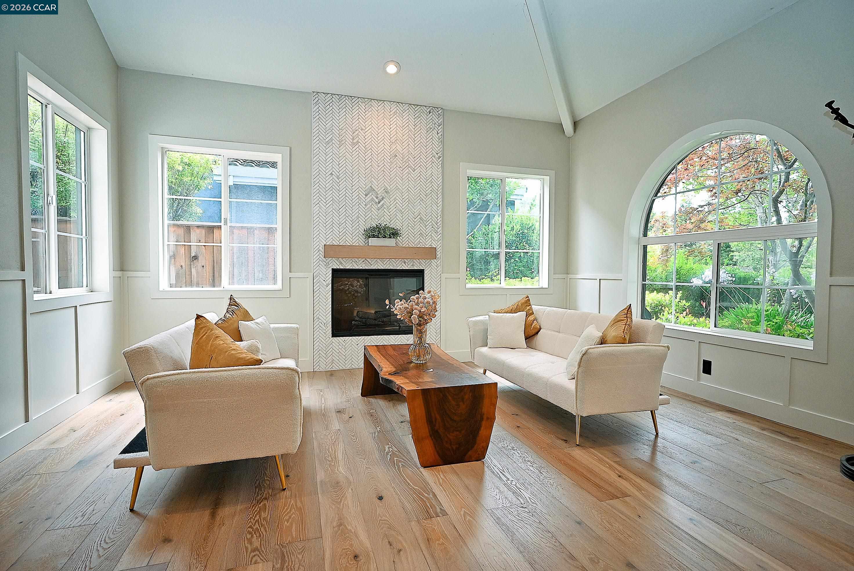 1239 Sunrise Ridge Drive Lafayette, CA 94549 - Photo 12 of 59 a living room with furniture and a fireplace