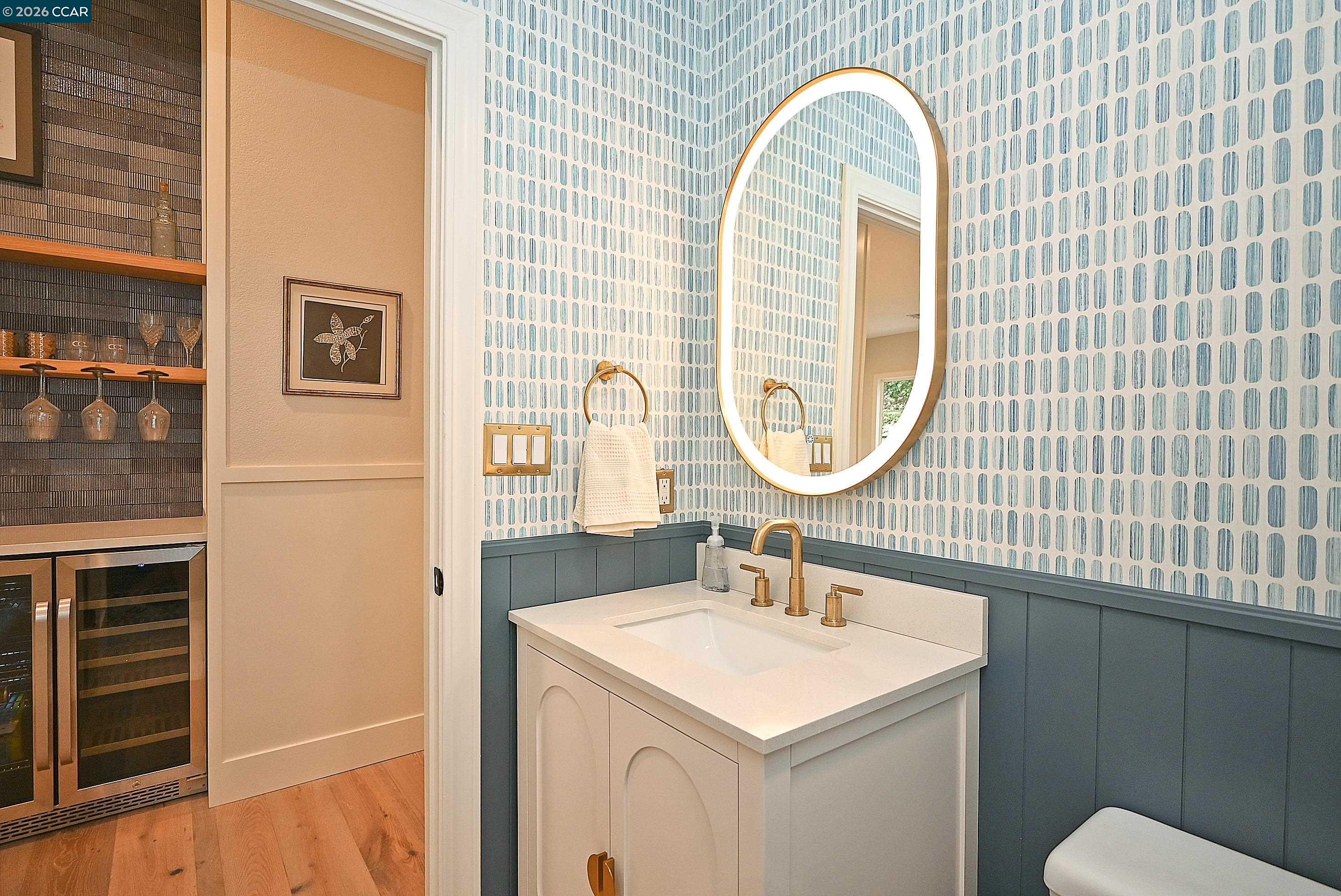 1239 Sunrise Ridge Drive Lafayette, CA 94549 - Photo 18 of 59 a bathroom with a sink a mirror a toilet and a window