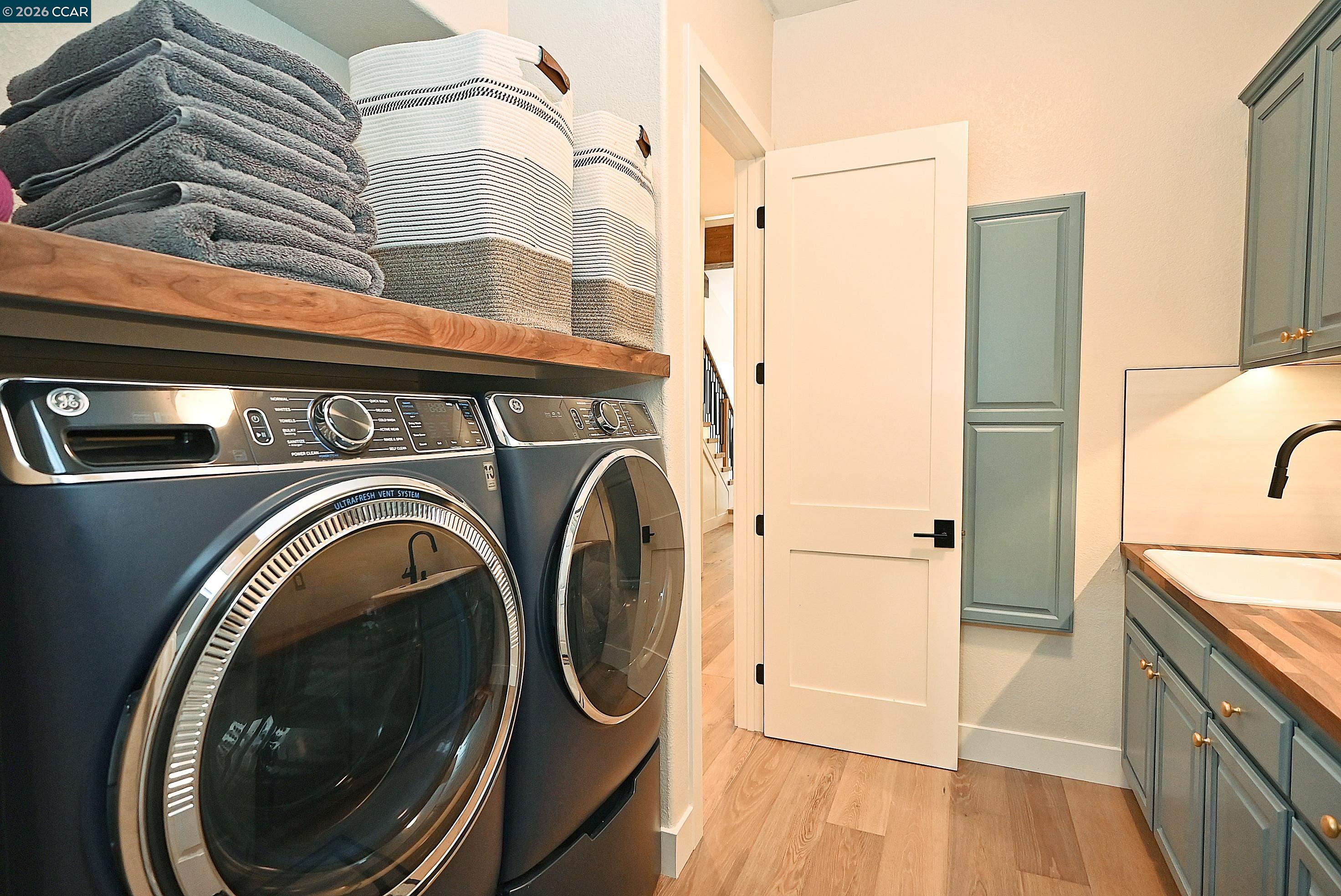 1239 Sunrise Ridge Drive Lafayette, CA 94549 - Photo 20 of 59 a utility room with dryer and washer