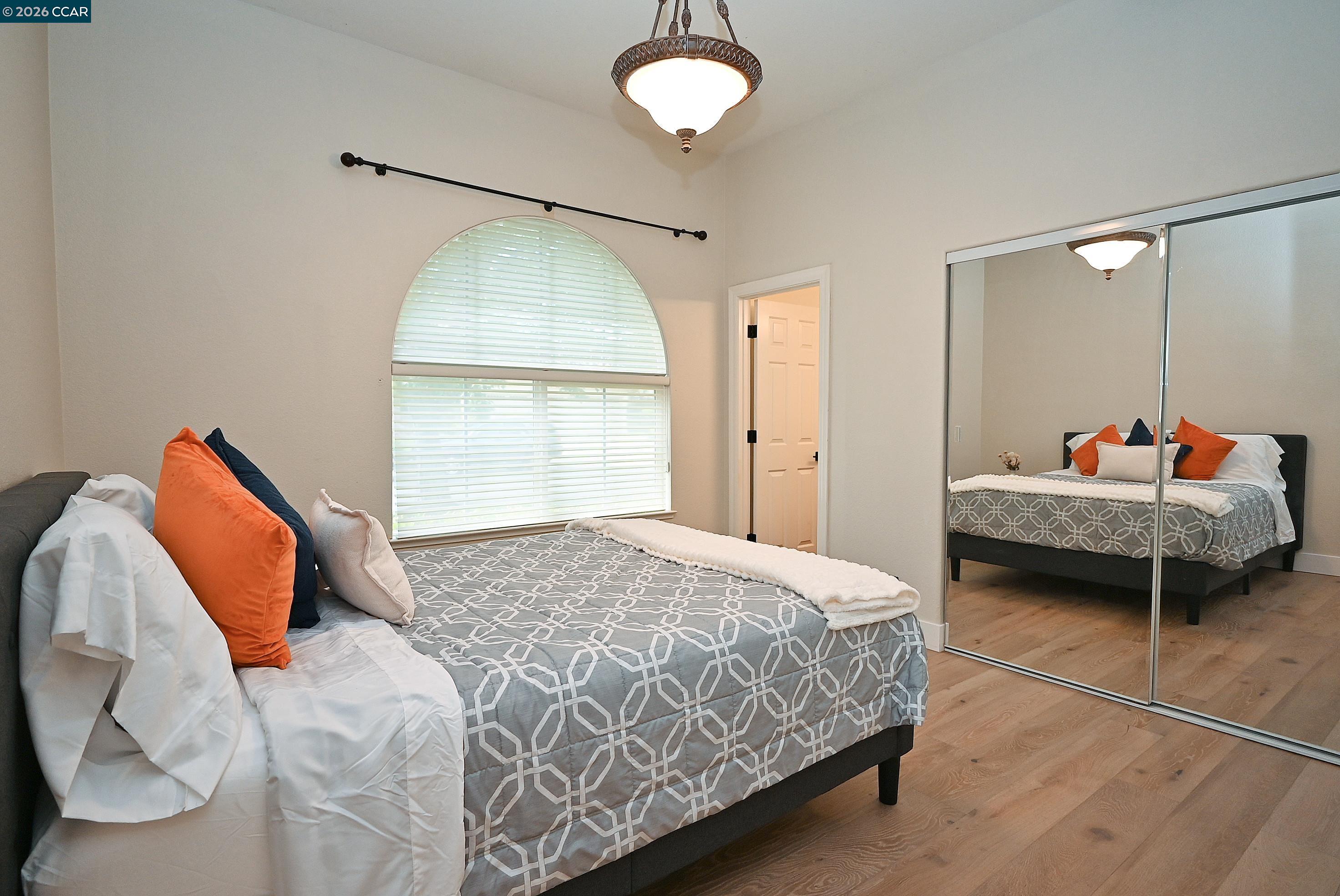 1239 Sunrise Ridge Drive Lafayette, CA 94549 - Photo 21 of 59 a bedroom with a bed and a window