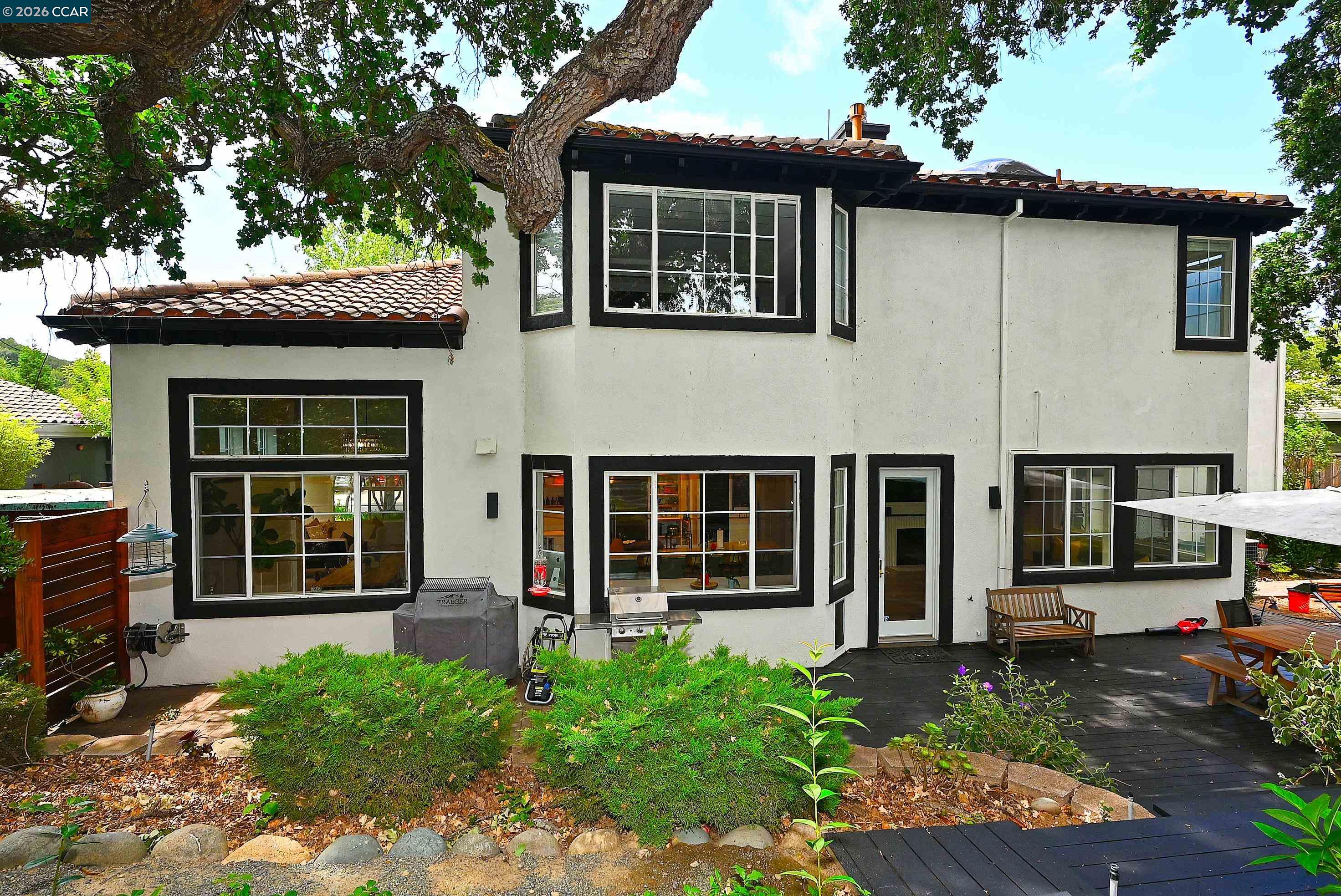 1239 Sunrise Ridge Drive Lafayette, CA 94549 - Photo 44 of 59 a front view of a house with garden