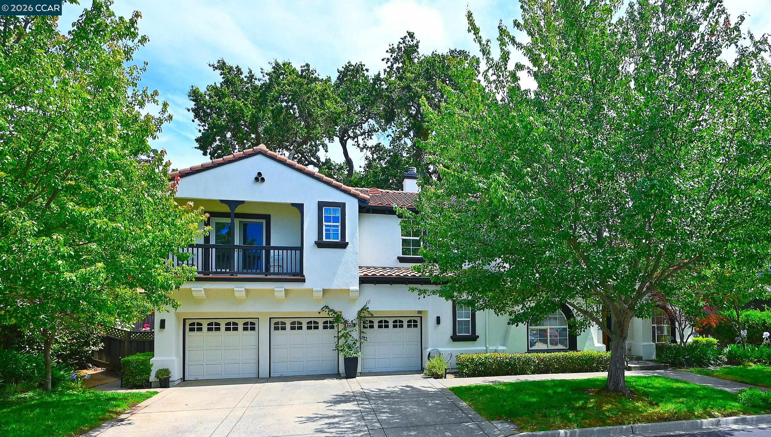 1239 Sunrise Ridge Drive Lafayette, CA 94549 - Photo 53 of 59 a front view of a house with a garden