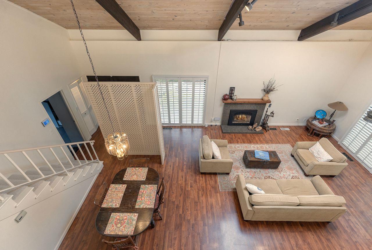 4 Country Club Gate, Unit 2 Pacific Grove, CA 93950 - Photo 5 of 11 a living room with furniture and a wooden floor