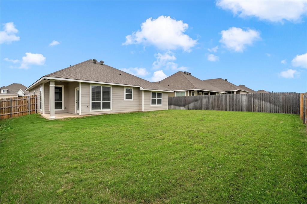 3224 Dottavio Road Lorena, TX 76655 - Photo 28 of 31 a front view of a house with garden