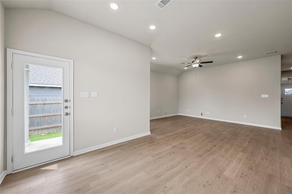 3224 Dottavio Road Lorena, TX 76655 - Photo 10 of 31 an empty room with wooden floor closet and windows