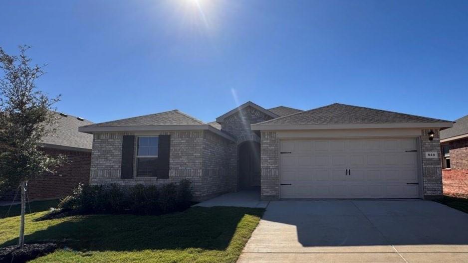 549 Marsh Street Cleburne, TX 76033 - Photo 18 of 20 a front view of a house with a yard