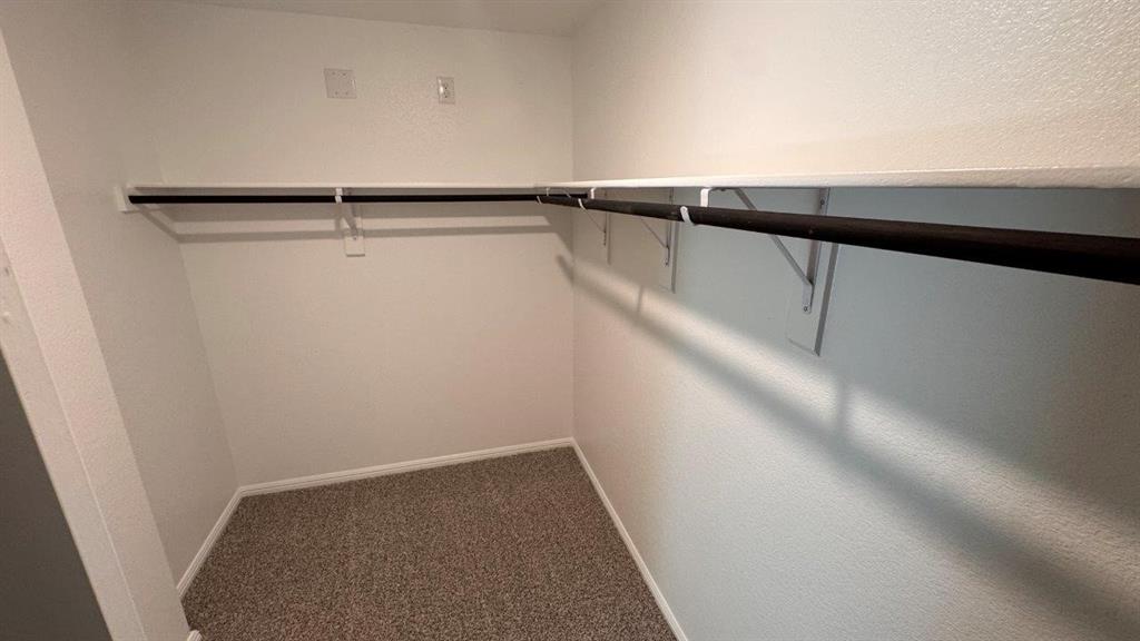 549 Marsh Street Cleburne, TX 76033 - Photo 11 of 20 a view of a walk in closet