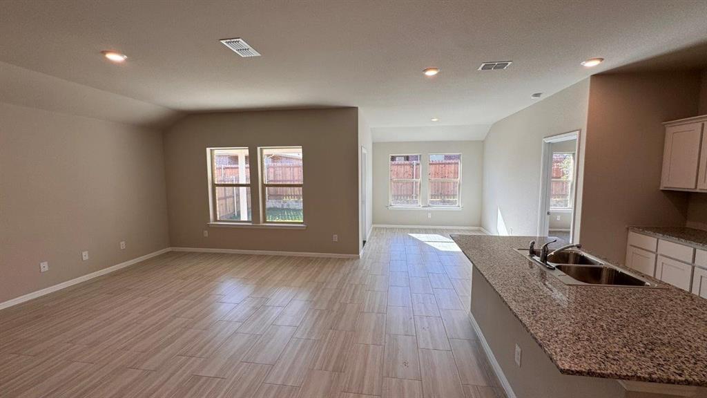549 Marsh Street Cleburne, TX 76033 - Photo 5 of 20 a living room with furniture and a window