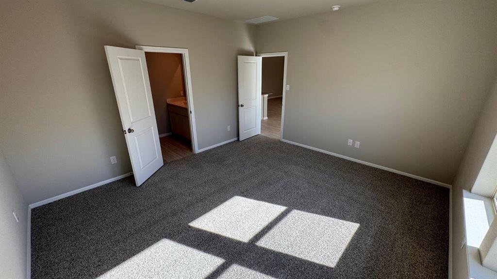549 Marsh Street Cleburne, TX 76033 - Photo 7 of 20 an empty room with an entryway