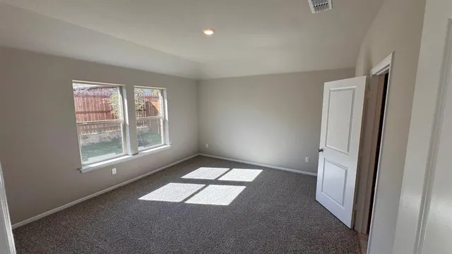 an empty room with an entryway