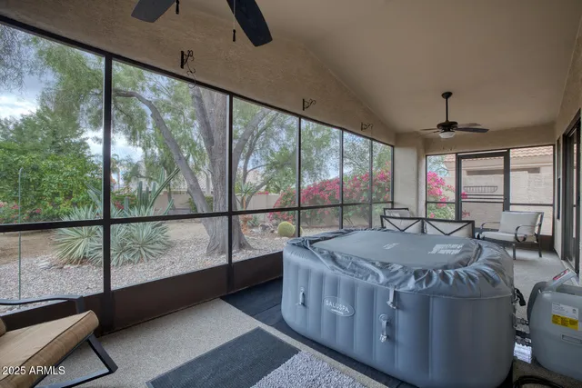 a bathroom with a sink toilet vanity and shower